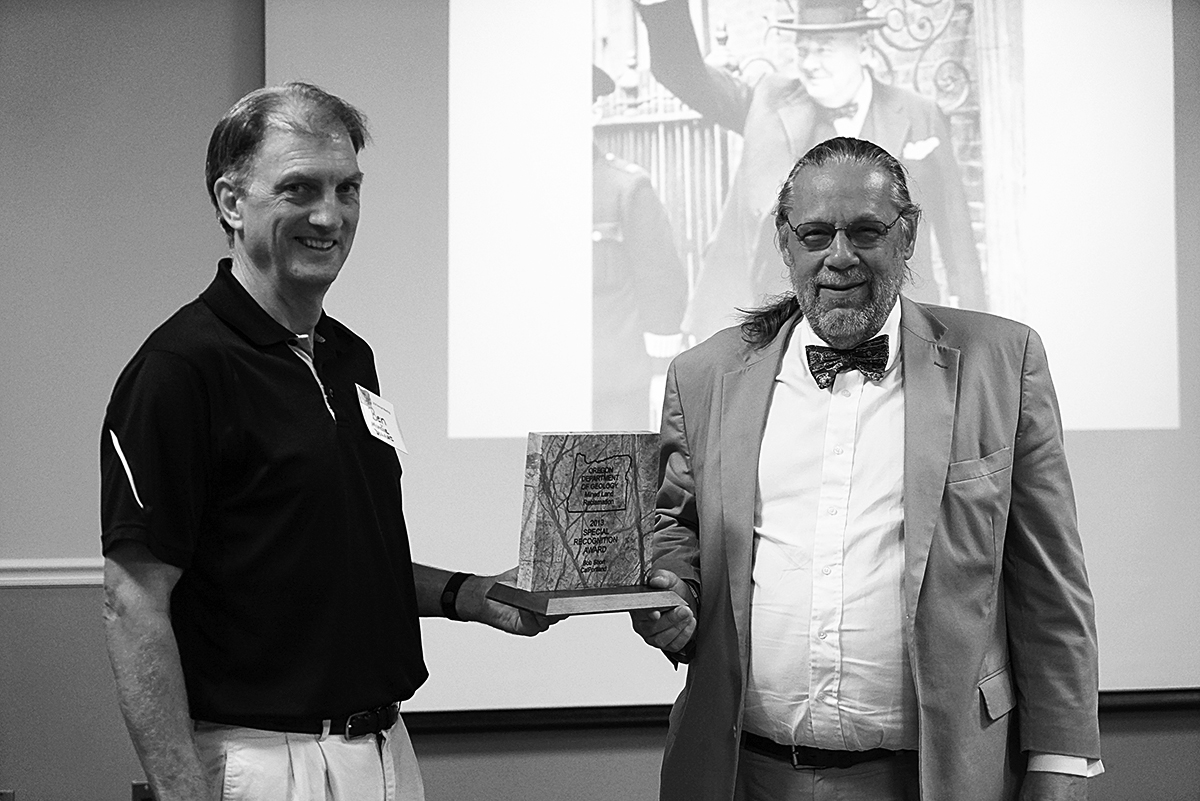 Bob Short receives Special Recognition Award from Ben Mundie of DOGAMI